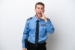 © luismolinero - Young police caucasian man isolated on white background shouting with mouth wide open