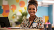© Евгений Архипов - Close-up of a nonprofit receptionist smiling during work, bright mission statement wall behind, clipboard with signup sheet and badges on desk, welcoming stock image