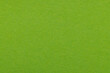 © banjongseal324 - Green paper texture background with natural fiber details,High-resolution close-up of vibrant lime green construction paper showing a grainy, organic fibrous texture. Ideal for eco-friendly concepts,