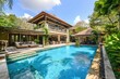 © nsit0108 - Stunning private villa with inviting pool, surrounded by lush vegetation, offering a luxurious and tranquil retreat