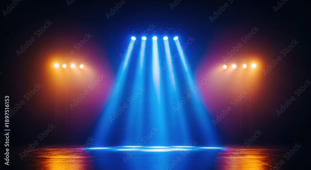 Dramatic stage lighting with blue and orange spotlights creating an ...