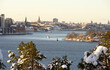 © a40757se - Winter view of Stockholm, Sweden. Old ferryboats on Lake Malaren in the foreground