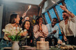 © Zamrznuti tonovi - Diverse friends celebrating birthday party, happy people gathering with cake, candles, and sparklers