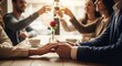 © Jafree - Man and woman holding hands on a cafe table during a double date on Valentines Day. Love, dating, celebration, and romance concept, corporate party