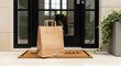 © ViskBx - Brown paper bag on welcome mat at front door entrance of modern home for delivery concept