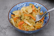 © Paweł Kacperek - Salad for dinner with raw grated carrots and white cabbage and a bit of vinegar