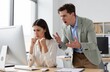 © Generative AI - Frustrated Businesswoman Facing Workplace Conflict with Angry Colleague, Stress and Pressure in Modern Office Environment