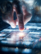 © Daria - A finger presses on a glowing digital touchscreen interface displaying technical data and futuristic holographic elements in a dark high-tech environment
