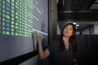 © ReeldealHD images - Woman Presenting Data Insights in Office Space