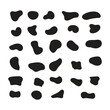 © TawfikStock - Abstract arrangement of black irregular shapes on a white background