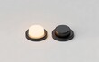 © mdfiroz - Two black and white circular objects on a gray surface