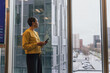 © ReeldealHD images - Contemplative Mature woman Observing city on a grey day