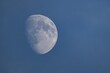 © Olaf Krüger/imageBROKER - Detailed image of the waxing moon with visible craters and spots during the day, dividing line between the day and night sides of the moon visible, Finland