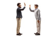 © Ljupco Smokovski - Young man and a senior man giving each other a high five