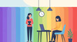 © barat - Two women in a colorful office, one standing with a tablet, one seated at a laptop