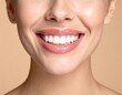 © Iwak - Close up of a smiling face showing white teeth and pink lips