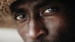 © Di Studio - close up of eyes of african man in hat
