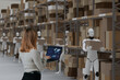 © Rendara Studio - Supply chain manager monitoring warehouse robots handling inventory operations