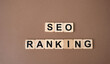 © Andrii Yalanskyi - Blocks with words SEO ranking. Position a website or webpage holds in the search engine results pages (SERPs) for a specific keyword or phrase. Concept of internet and technology