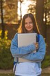 © BillionPhotos.com - Portrait of happy student posing in university campus