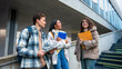 © ADDICTIVE STOCK - College students discussing future academic goals