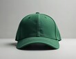 © Viktor - Plain green baseball cap sits on white surface. Simple headwear offers sun protection, adds style. Solid color makes versatile for outfit, suitable for casual athletic wear. Ideal for everyday use