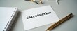 © Maryna - Paper with word introduction sits on office desk beside pen and notebook. Blank paper waits for notes or plan. Ready for new task, project start, or business idea.