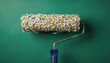 © THESUN - Creative concept of paint roller with fresh natural flower on green background. whimsical art idea for spring home improvement