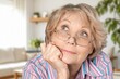 © BillionPhotos.com - Head shot of happy old woman posing at home
