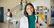 © MagicDavid25/peopleimages.com - Learning, portrait and smile of girl student on high school campus for development or growth. Education, future and study with happy teen learner in academy hallway for knowledge or opportunity