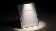 © 69 - White Book with Top Secret Cover Illuminated by Spotlight in Dark Setting