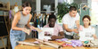© JackF - Attentive young girl working with textile and other sewing during dressmaking class