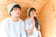 © buritora - A young couple wearing T-shirts in a sauna