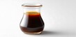 © Azib - A jar filled with rich teriyaki sauce and zesty lemon vinaigrette, placed against a clean white background