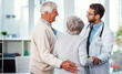 © peopleimages.com - Hospital, consulting and doctor with senior couple for support, compassion and news for diagnosis. Healthcare, office and elderly man and woman for talking, medical results and feedback in clinic