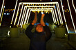 © TrueShot | Westend61 - Girl enjoying Christmas lights at night in urban city setting
