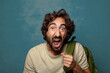 © kues1 - young adult bearded man with a bag