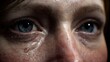 © Berkah - Close up of human eyes with a tear conveying emotional distress