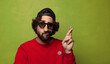 © kues1 - young adult bearded man with cap and sun glasses