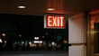 © forenna - Inside a theater lobby, an illuminated emergency exit sign offers reassurance to patrons, representing the essential safety measures in public venues for audiences enjoying entertainment while