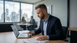 © ULFATRAZA - Professional Australian male, around 30 years old, working in a modern, clean office environment, reviewing financial reports  on laptop, focused and thoughtful, natural lighting, minimalistic corpora