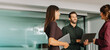 © Stock 4 You - Group of happy businesspeople managers talking having a break from meeting. Professional people discussing work standing in office boardroom. Collaboration, business attire, productive team atmosphere
