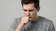 © Olga - Man Coughing with Cold Symptoms