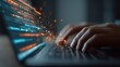 © ddwi - Hands typing on laptop keyboard with data streams abstract background