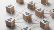 © Hanny - Wooden cubes connected by wires with blue human icons, representing social network, teamwork, and community connections in business concept