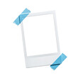 © GraphicsWorld - Blank Polaroid photo frame with blue tape