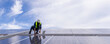 © kanpisut - Engineer service check installation solar cell on the roof of factory. Engineers walking on roof inspect and check solar cell panel. Engineer working inspection installation solar cell on the roof