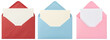 © Feroz Qazi - a clean photograph presenting three open colorful envelopes in red, blue, and pink, each holding a blank white card, ready for text.