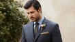 © LimeSky - Outdoor portrait of a bearded man in formal attire, featuring a boutonniere; represents men's formal wear