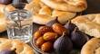 © SyedaMahfuja - This vibrant close-up captures a traditional Iftar or Suhoor setting, featuring a clear glass of refreshing water with visible bubbles, indicating a cool and invigorating drink.